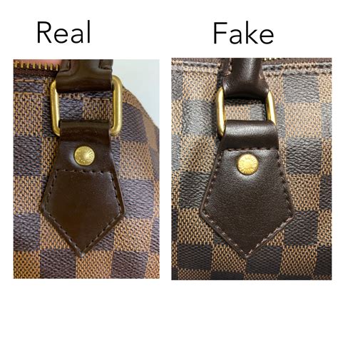 how to tell fake louis vuitton purse|louis vuitton purse real.